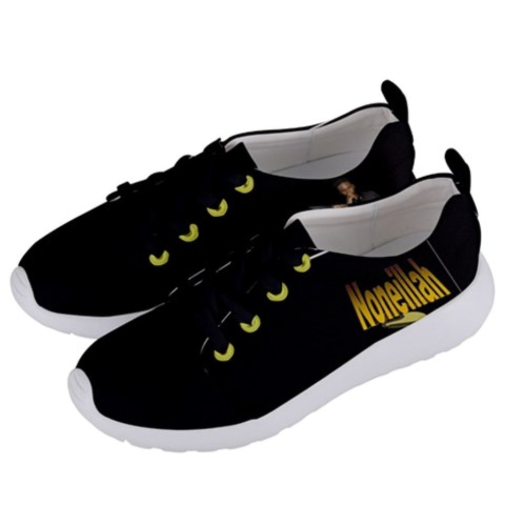 Noneillah's black and gold sneakers